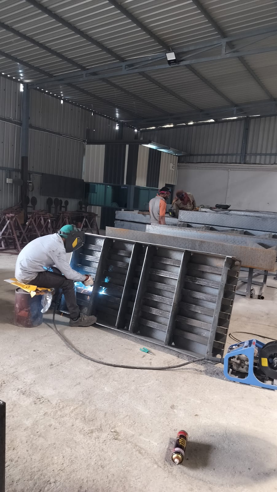 Fabrication and welding work inside the manufacturing facility